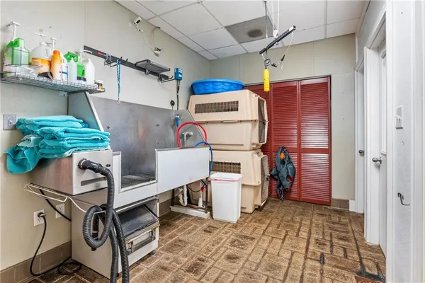 a living room with furniture a dining table and chairs