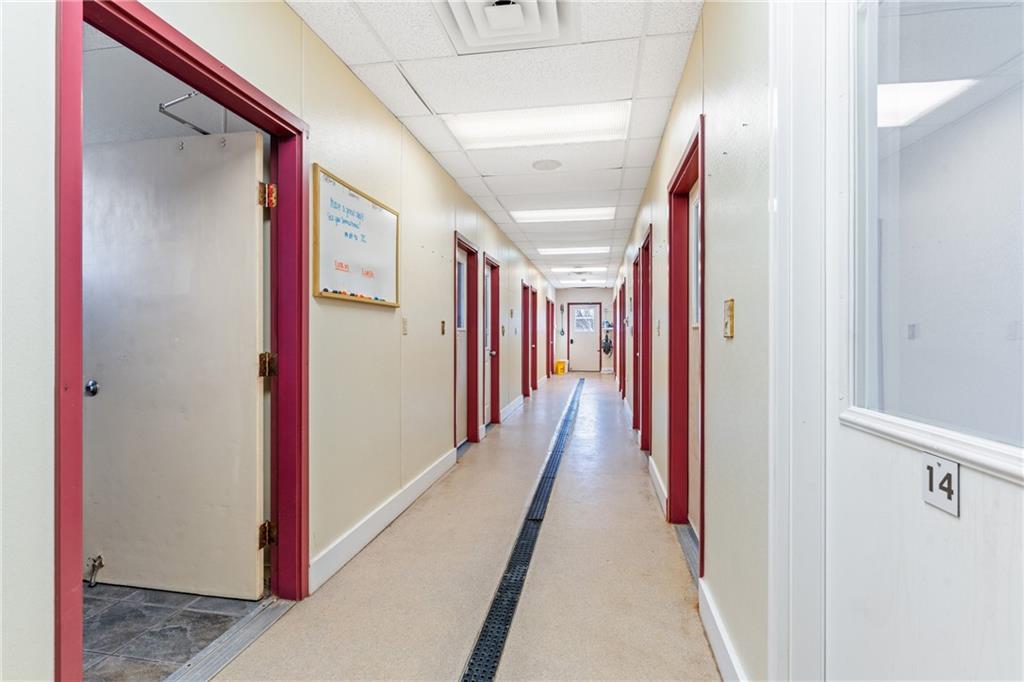 316 Noll Road Georgetown, PA 15043 - Photo 40 of 48 a hallway with wooden floor and stairs