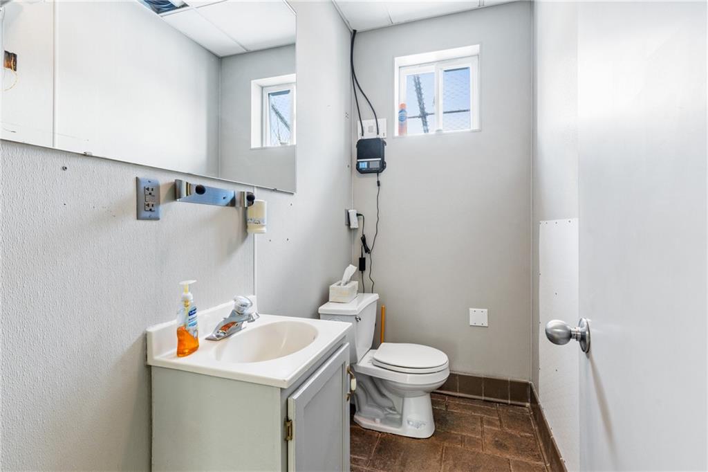 316 Noll Road Georgetown, PA 15043 - Photo 42 of 48 a white toilet sitting next to a bathroom sink
