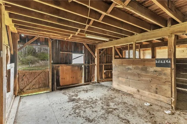 a view of a wooden deck with a big yard