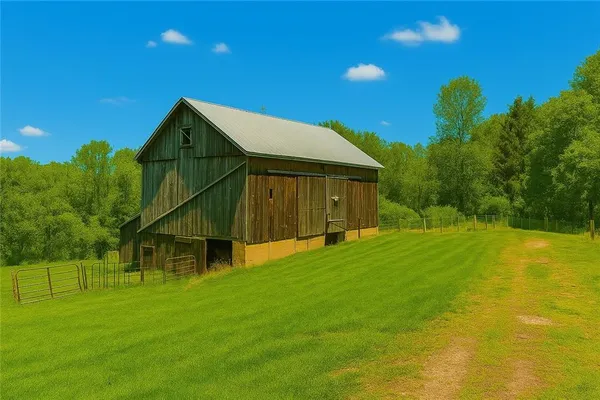 a view of an house with backyard space and balcony