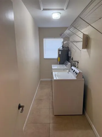 a view of a room with a window