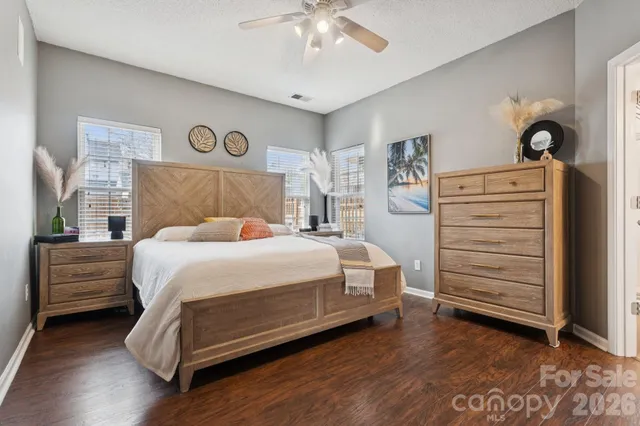 a bedroom with a bed and a cabinets