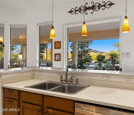 a bathroom with a sink double vanity and a mirror
