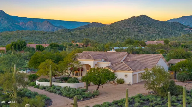 a view of a street with a building in the background