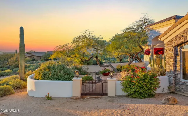 an aerial view of a house with a garden