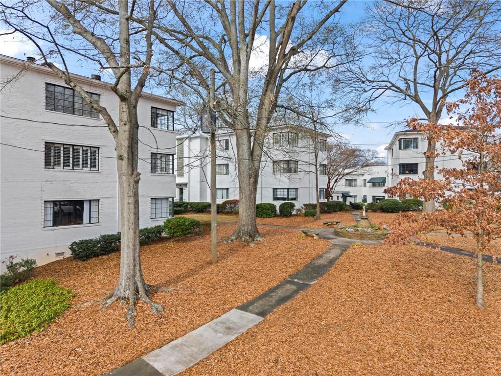1120 Briarcliff Road Northeast, Unit 3 Atlanta, GA 30306 - Photo 20 of 27 a street view with large trees