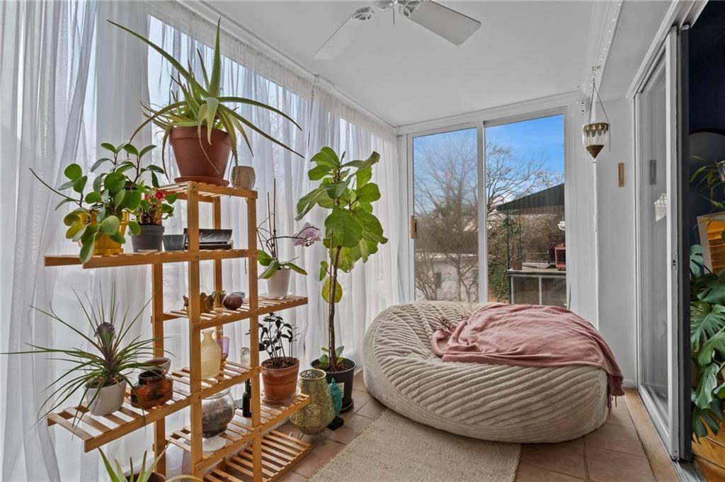 1120 Briarcliff Road Northeast, Unit 3 Atlanta, GA 30306 - Photo 2 of 27 a living room filled with furniture