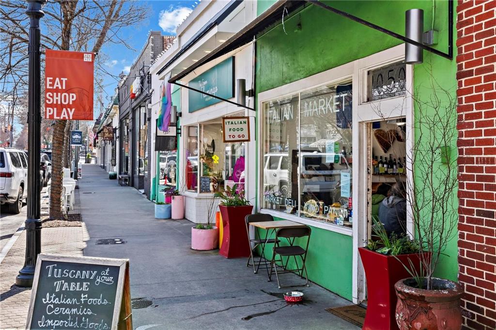 1120 Briarcliff Road Northeast, Unit 3 Atlanta, GA 30306 - Photo 23 of 27 a view of path along with retail shop and buildings