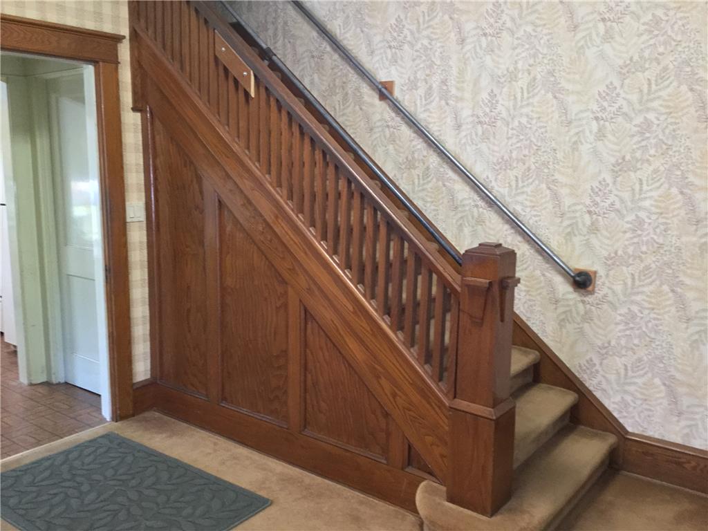 1105 Main Street Slatington, PA 18080 - Photo 26 of 31 Rich wood paneling and a traditional staircase define this inviting entry.