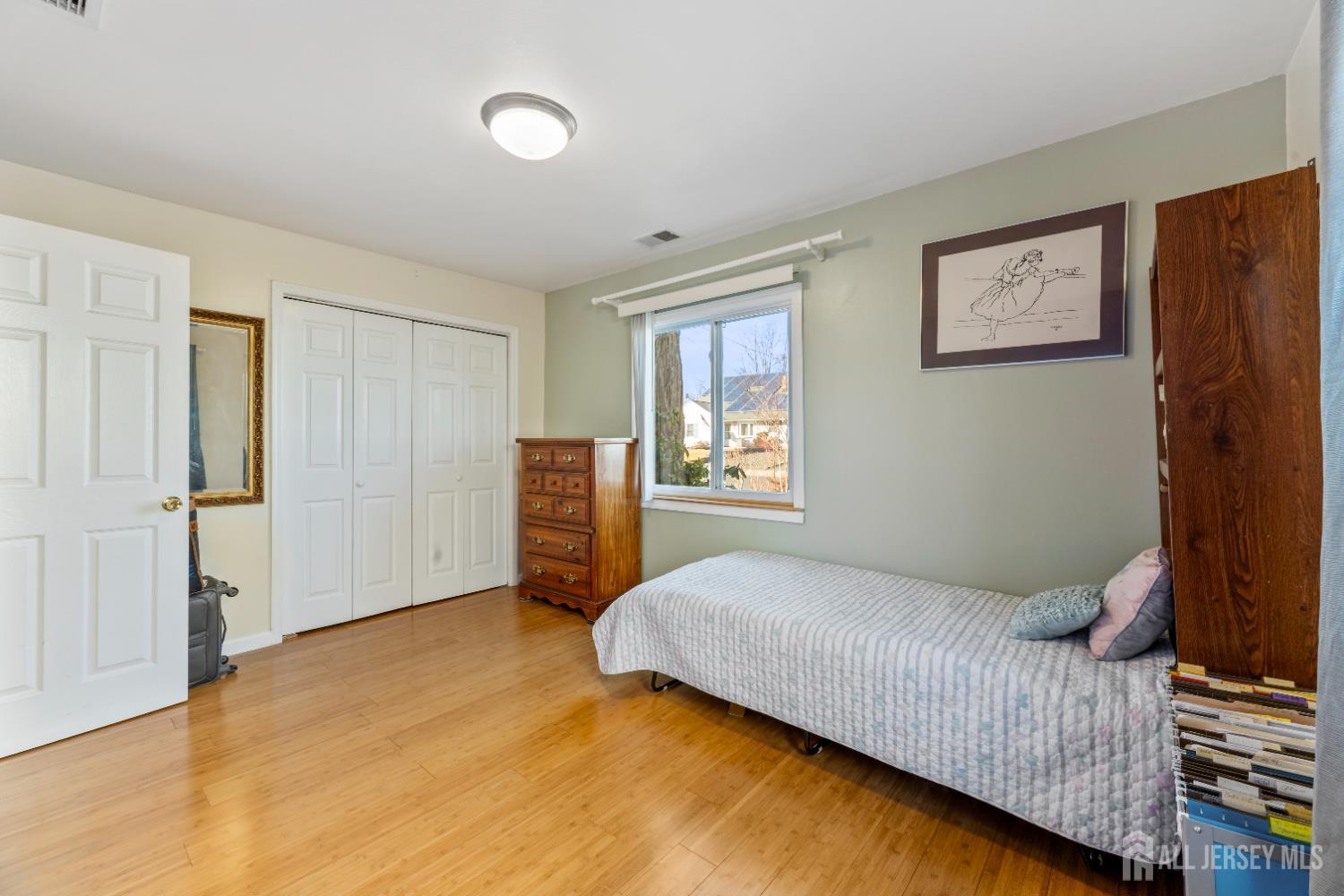 46 Runyon Avenue Edison, NJ 08817 - Photo 20 of 48 a bedroom with a bed and a window