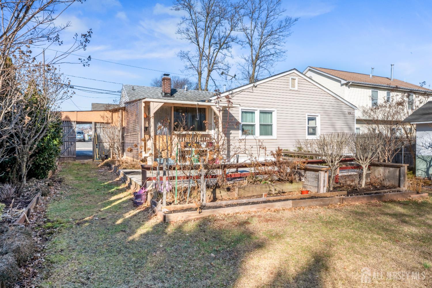 46 Runyon Avenue Edison, NJ 08817 - Photo 29 of 48 a view of a house with a yard