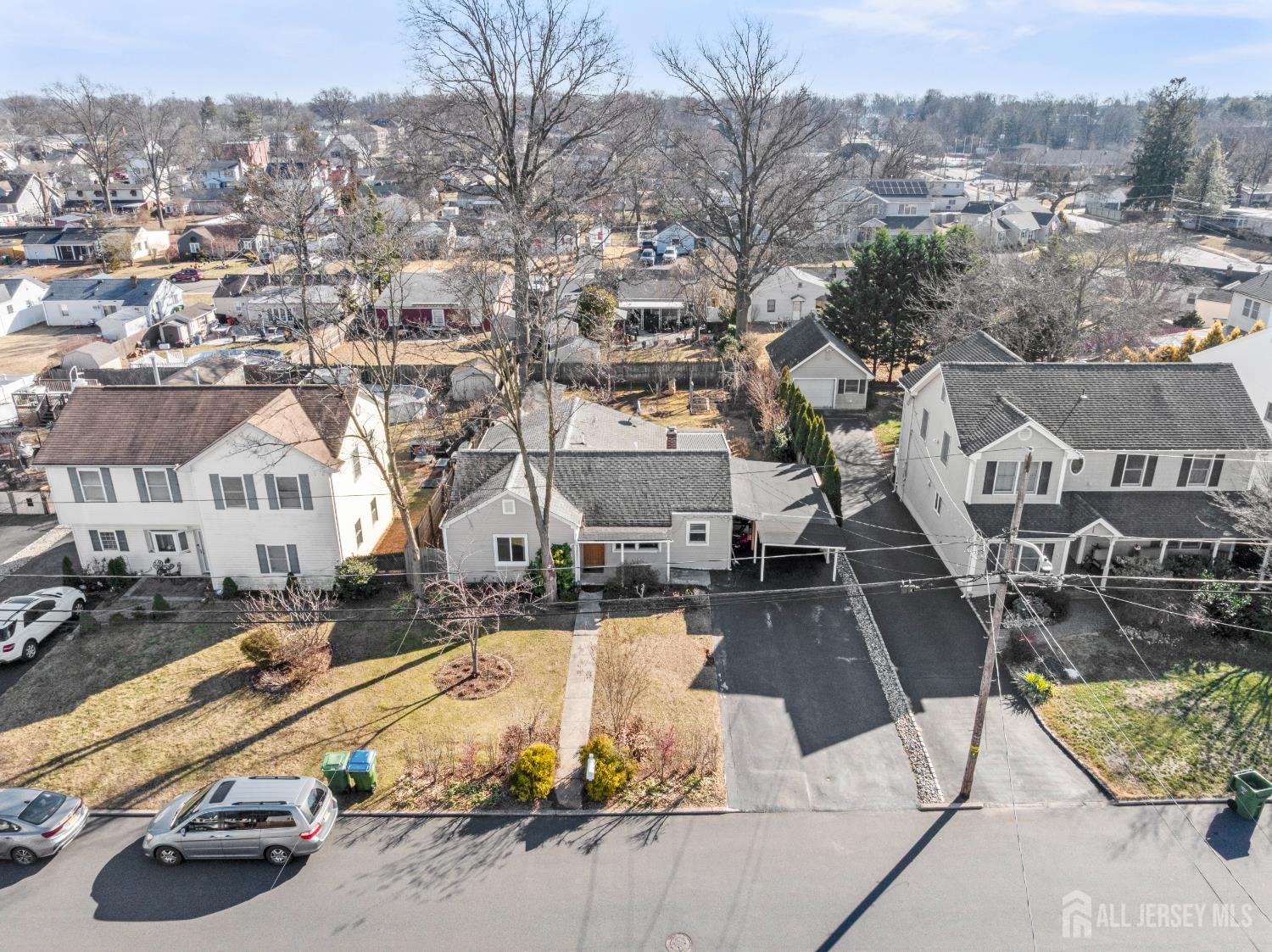 46 Runyon Avenue Edison, NJ 08817 - Photo 31 of 48 an aerial view of houses with a swimming pool