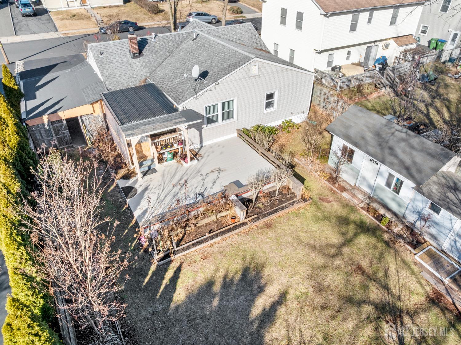 46 Runyon Avenue Edison, NJ 08817 - Photo 32 of 48 a view of a house with a snow