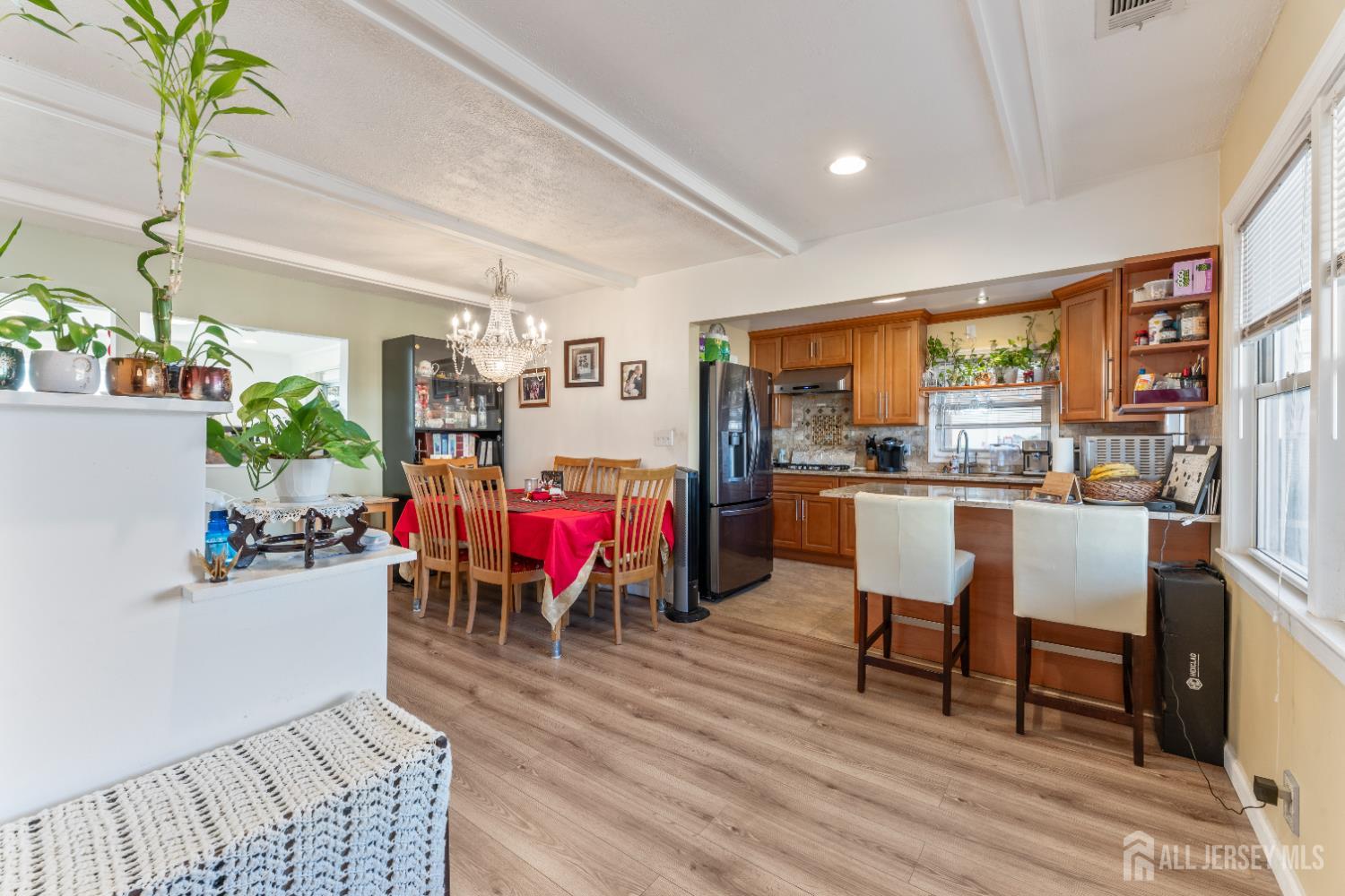 46 Runyon Avenue Edison, NJ 08817 - Photo 4 of 48 a living room with dining room and wooden floor