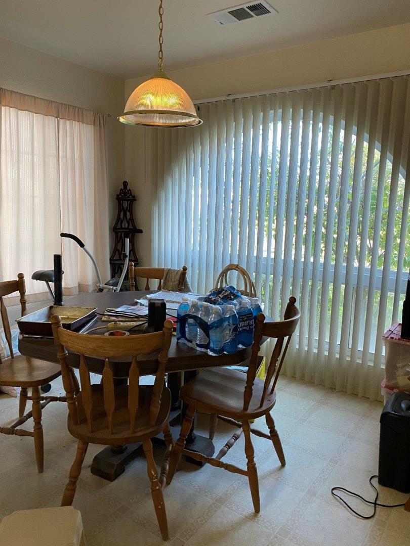 1431 Cardinal Street Los Banos, CA 93635 - Photo 6 of 10 a view of a workspace with furniture and window