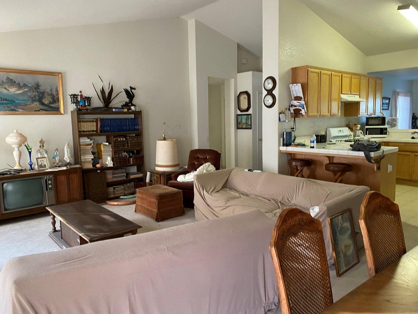 1431 Cardinal Street Los Banos, CA 93635 - Photo 7 of 10 a bedroom with furniture and painting on the wall