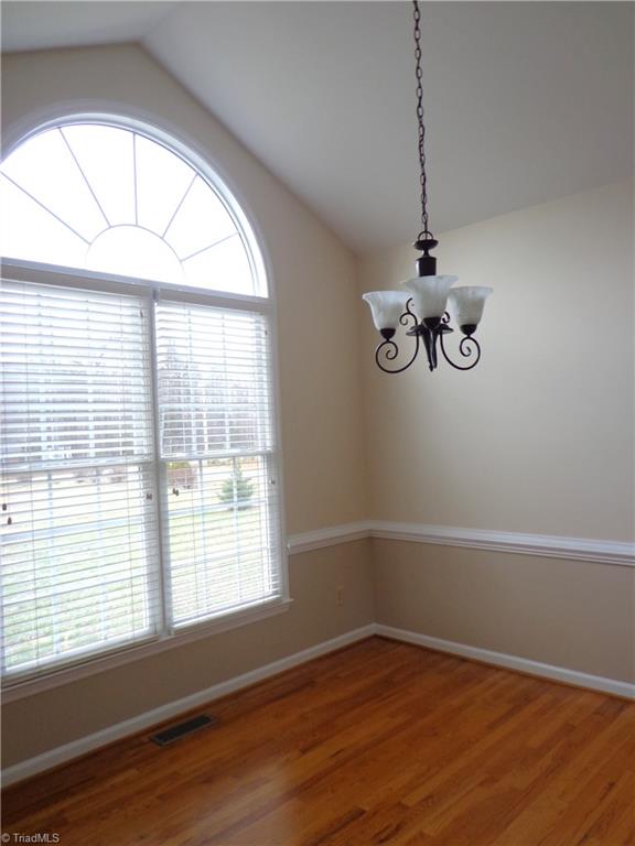 1790 New Salem Road Randleman, NC 27317 - Photo 4 of 21 Formal DR w/HDWD floors & Chair Rail. Updated Paint. Cathedral Ceiling