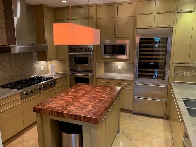 a kitchen with a stove and a microwave