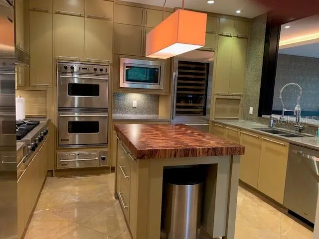 a kitchen with a stove and a microwave