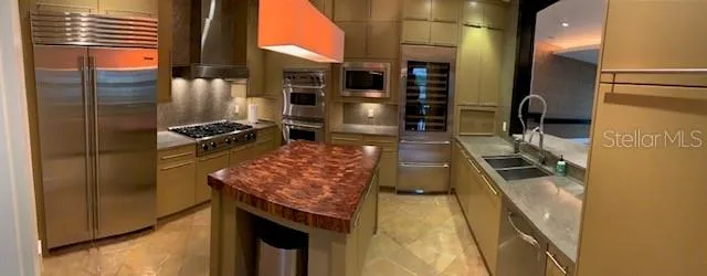 a kitchen with a stove and a refrigerator