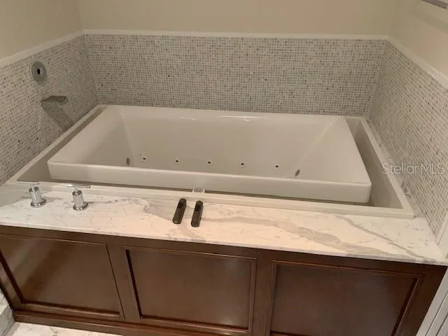 a bathroom with a bathtub