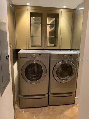 a utility room with dryer and washer