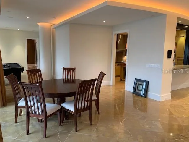 a view of a dining room with furniture
