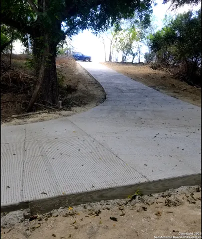 a view of a backyard of a house