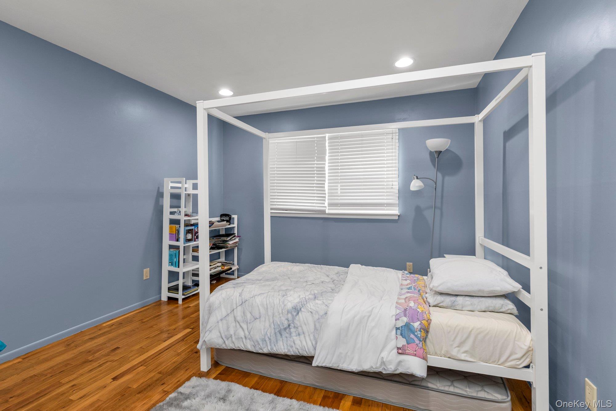 2038 Ripley Lane Merrick, NY 11566 - Photo 11 of 22 Bedroom with hardwood floors