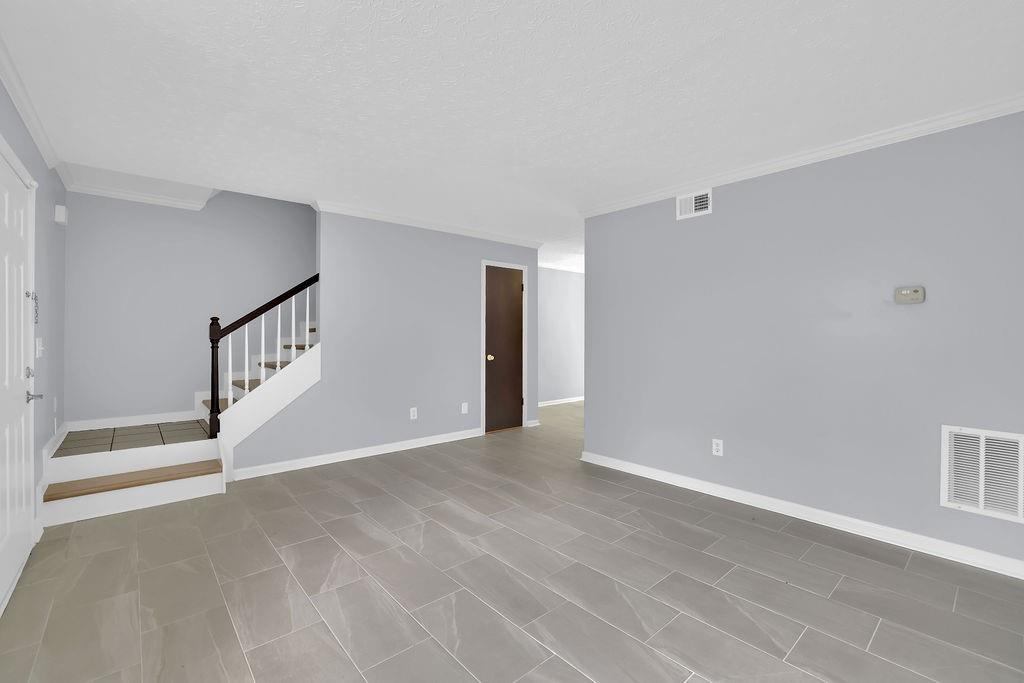 1424 Springleaf Circle Southeast Smyrna, GA 30080 - Photo 7 of 38 a view of an empty room with staircase