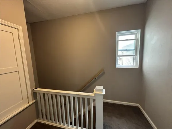 a view of hallway with window