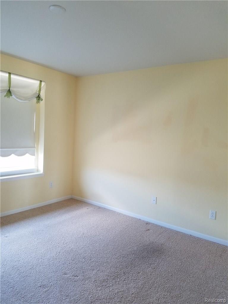 1869 Vanderbilt Road, Unit 32 Canton, MI 48188 - Photo 26 of 35 2ND BEDROOM 2 (2).jpg