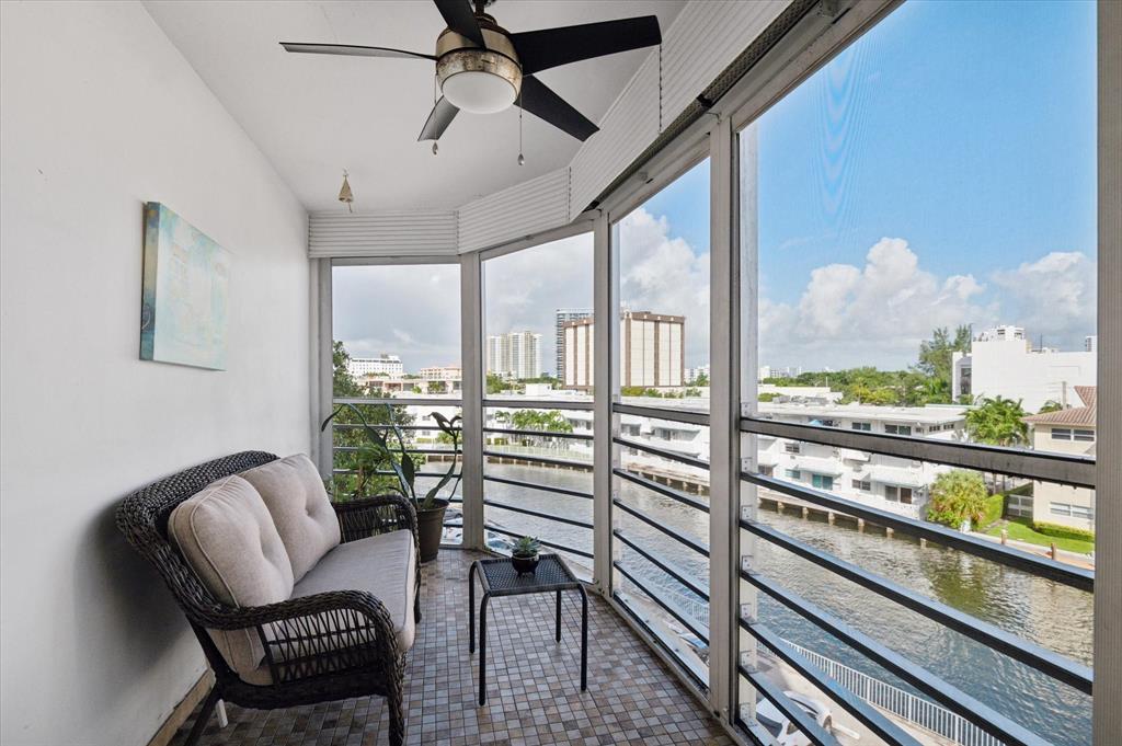 100 Golden Isles Drive, Unit 508 Hallandale Beach, FL 33009 - Photo 14 of 17 a view of a living room with furniture window and outside view