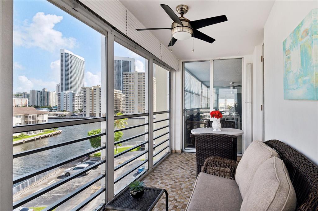 100 Golden Isles Drive, Unit 508 Hallandale Beach, FL 33009 - Photo 15 of 17 a room with furniture and a window