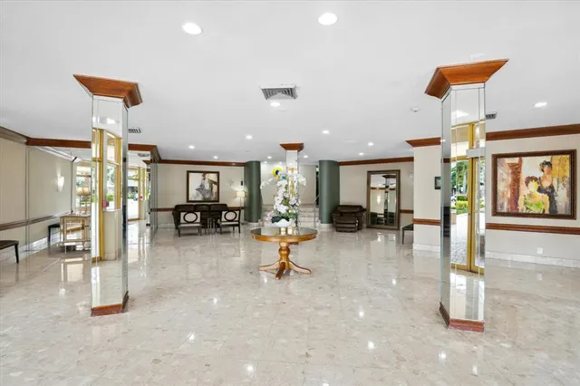 a living room filled with furniture and a table