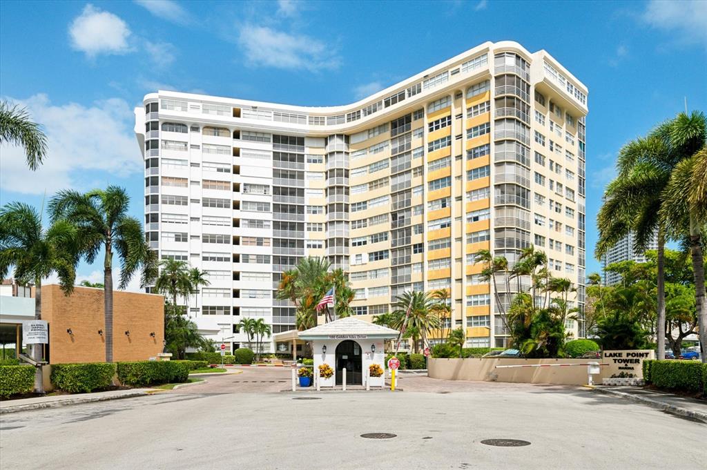 100 Golden Isles Drive, Unit 508 Hallandale Beach, FL 33009 - Photo 2 of 17 front view of a building with a street