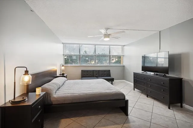 a bedroom with a bed and furniture