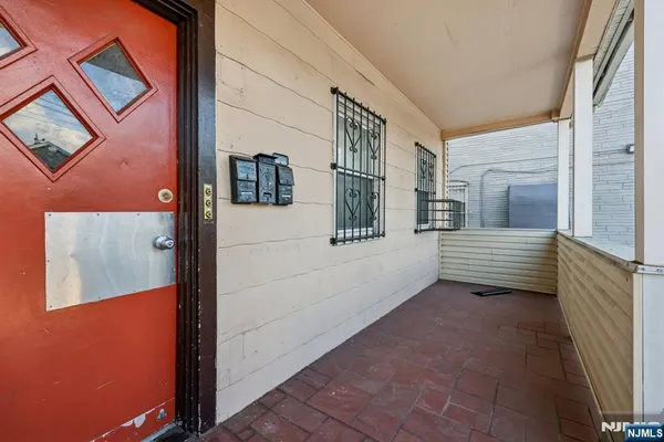 a view of a porch with a door