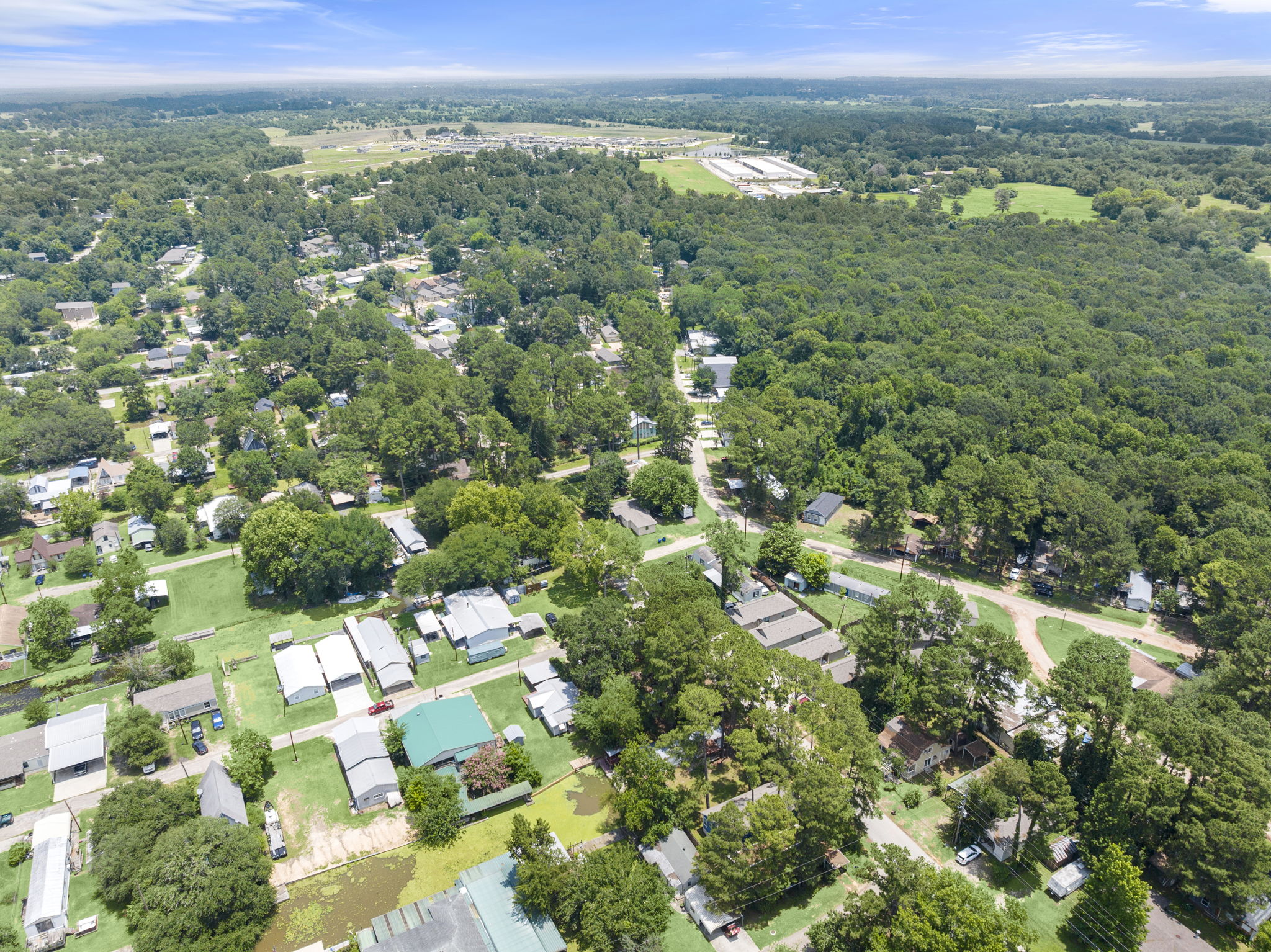 9649 Warm Spring Willis, TX 77318 - Photo 24 of 30 Vast green spaces and a serene landscape surround this neighborhood.