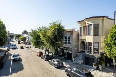a view of a car park in front of a building