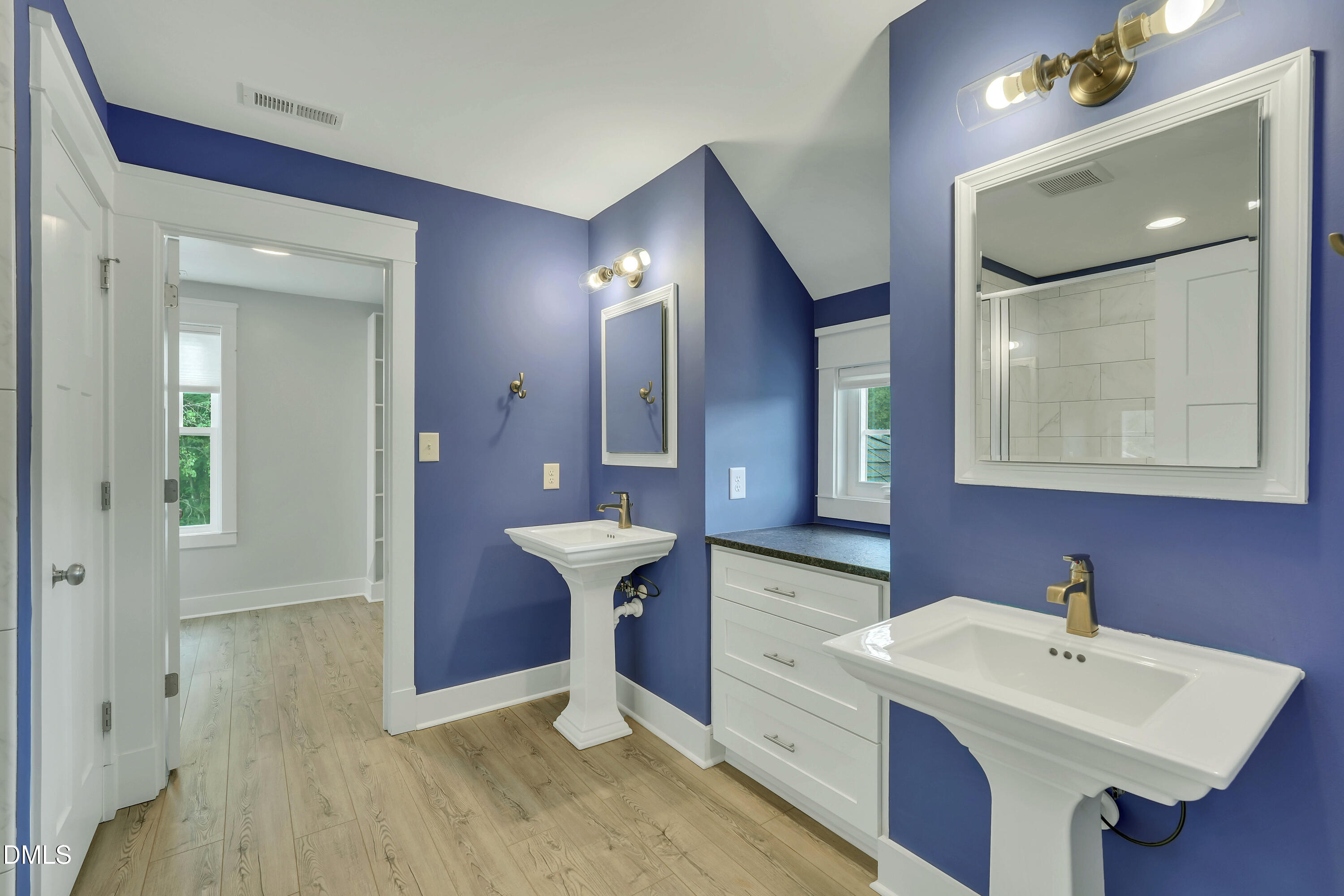 609 Jerome Road Durham, NC 27713 - Photo 22 of 40 Primary suite Bathroom and Closet