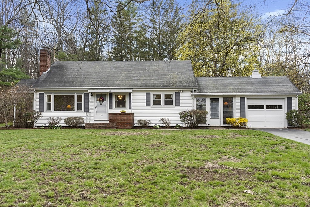 front view of a house and a yard