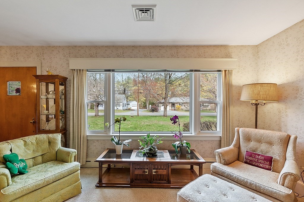 61 Harvard Road Shirley, MA 01464 - Photo 14 of 42 a living room with furniture and a large window
