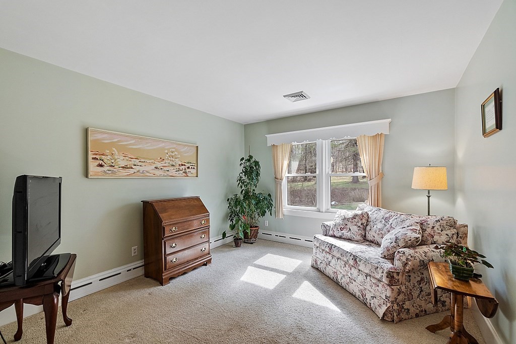 61 Harvard Road Shirley, MA 01464 - Photo 20 of 42 a bedroom with furniture and a window