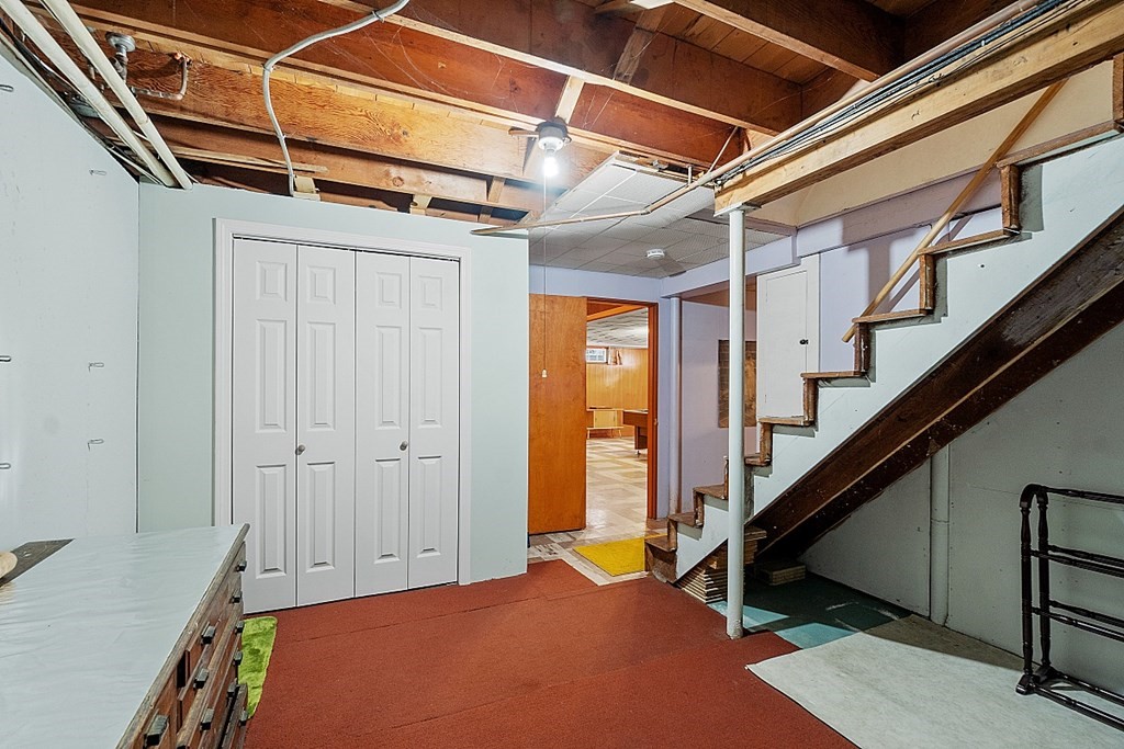 61 Harvard Road Shirley, MA 01464 - Photo 29 of 42 a view of an empty room with stairs