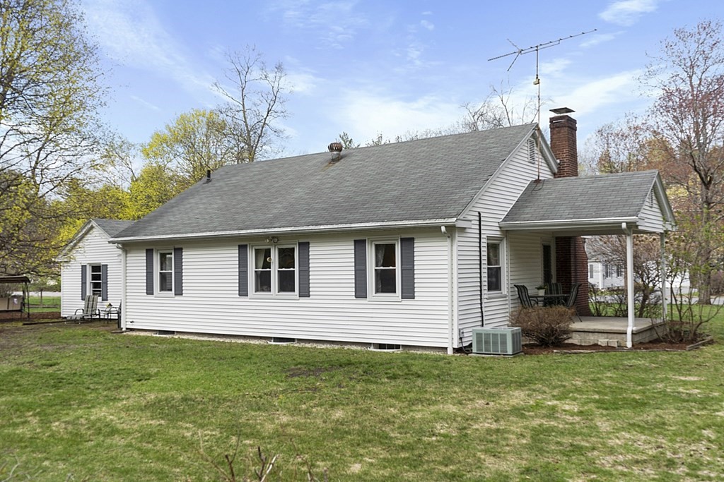 61 Harvard Road Shirley, MA 01464 - Photo 34 of 42 a front view of a house with a garden