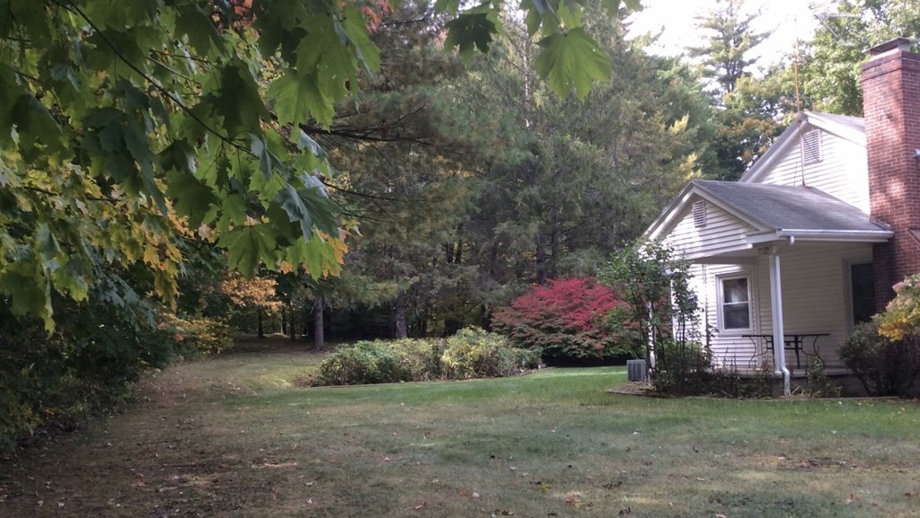 61 Harvard Road Shirley, MA 01464 - Photo 39 of 42 a view of a house with a yard and garden