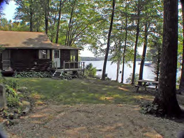 122 Kibbe Road Otis, MA 01029 - Photo 5 of 8 a view of a house with a yard