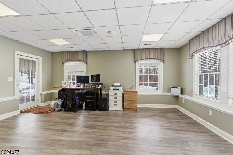 4 Deer Trail Road Saddle River, NJ 07458 - Photo 29 of 37 a living room with furniture window and wooden floor